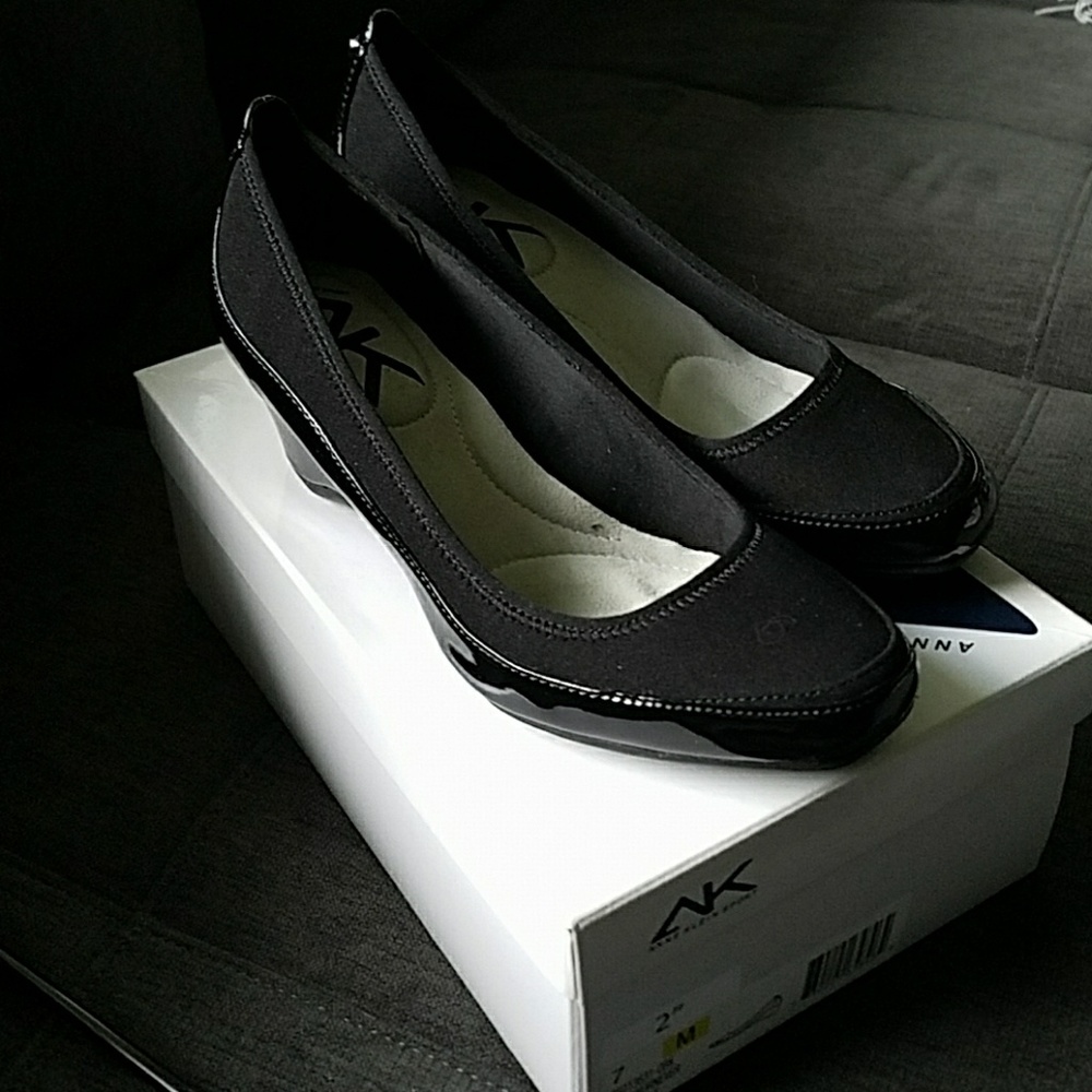 Black 2 inch heeled shoes. Brand new, still in box